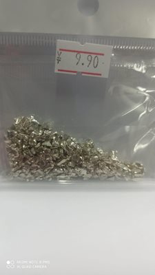 אבנים לקישוט צבע כסף מטאלי10 גרם.
